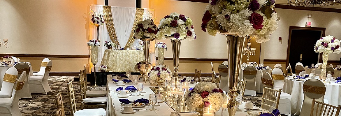 table set up with flowers and candles at wedding reception